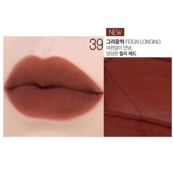 Son Kem BBIA Velvet Lip Tint - 39 Feign Longing: Màu son thời thượng với hòa trộn độc đáo giữa 3 sắc đỏ, cam, nâu, tạo thành màu đỏ gạch thời thượng, phù hợp với mọi loại da.